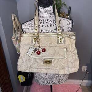 COACH PENELOPE LINEN SIGNATURE CARRYALL HANDBAG  WITH CHERRY CHARM